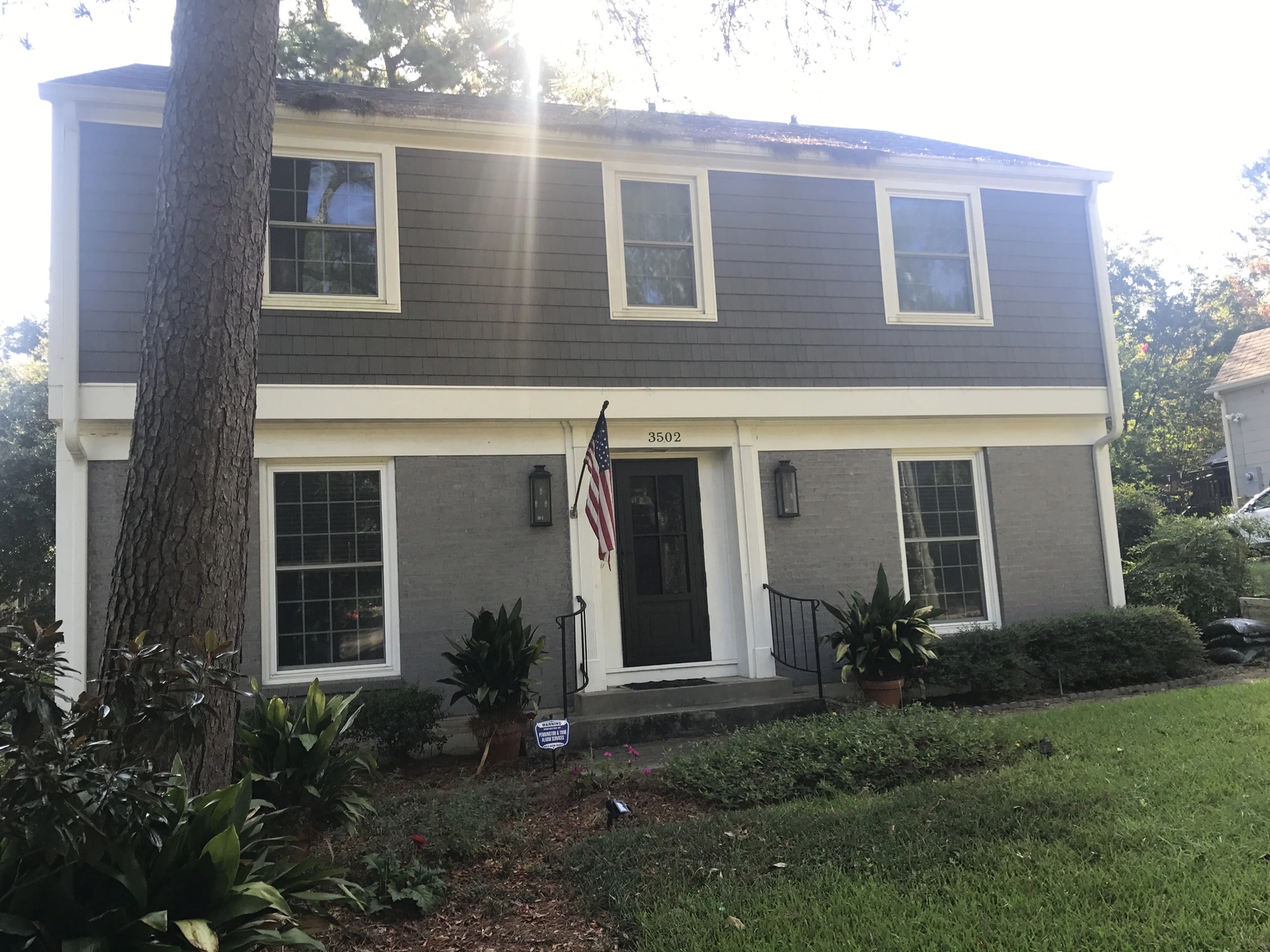 New windows and exterior work — house front view landscaping details