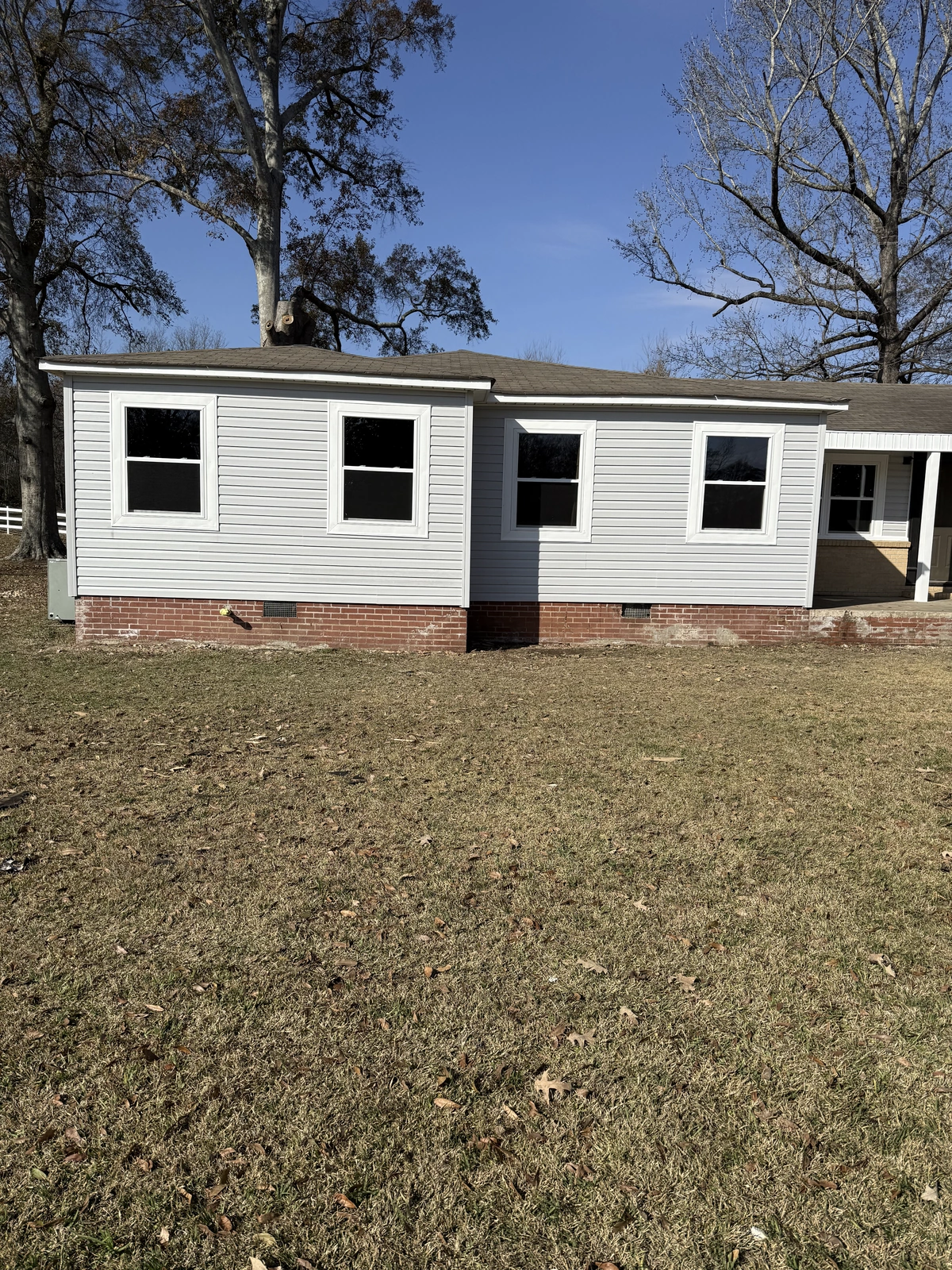 Bright new replacement windows on a home